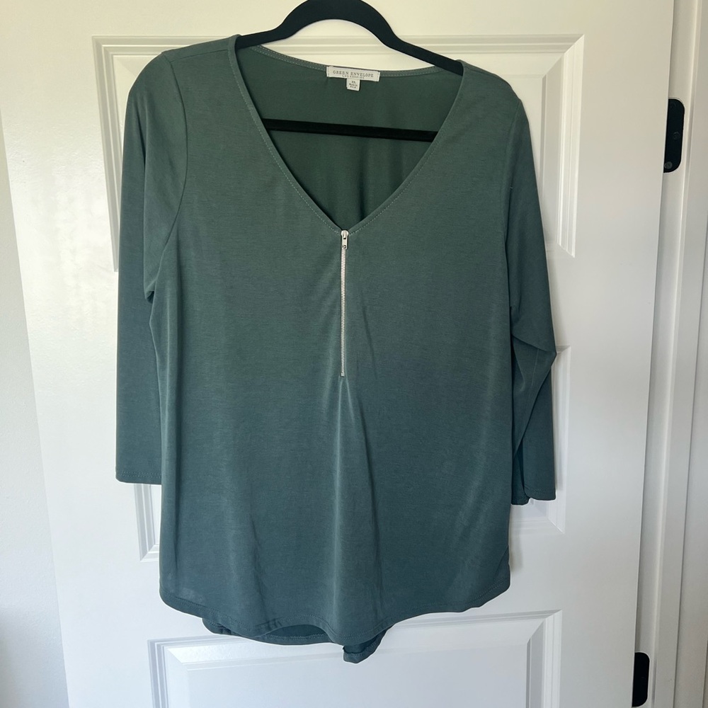 Green Envelope 3/4 sleeve green shirt. EUC. Zipper front. Non-smoking home.